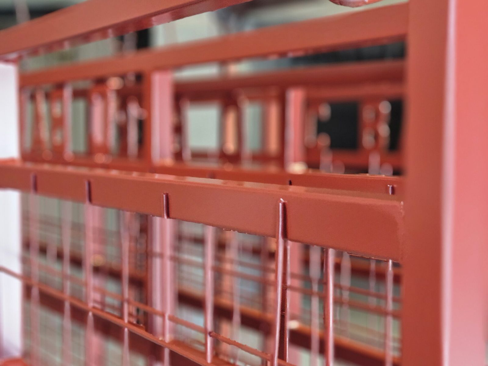 Cattle panel gate coated in gloss red