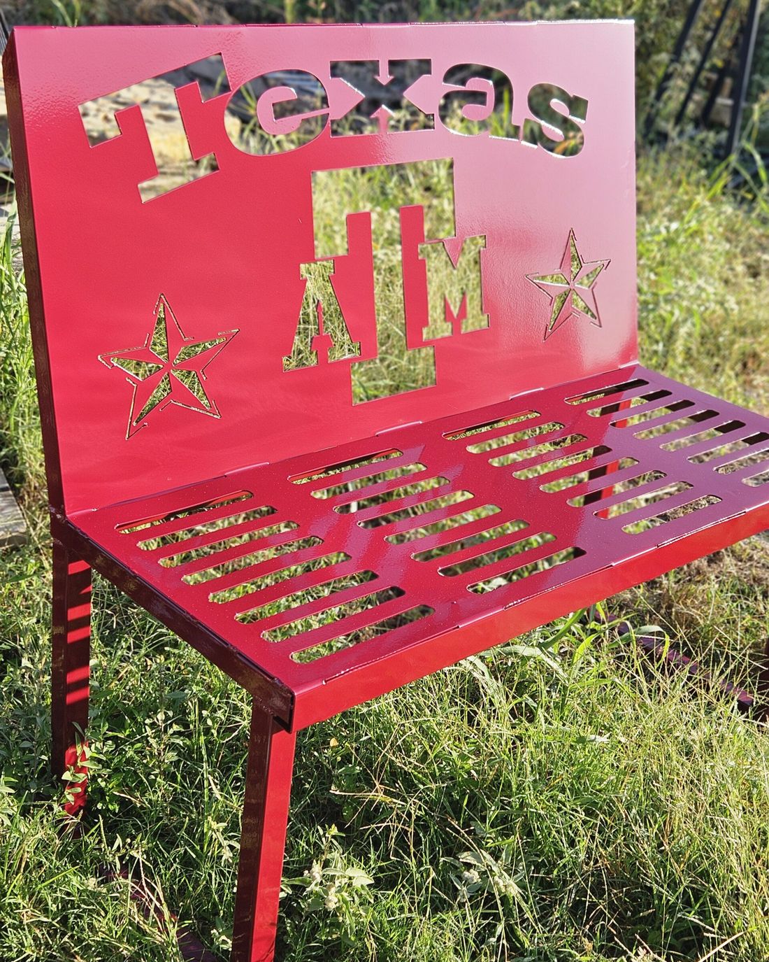 Spirit Bench, powder coated brick red